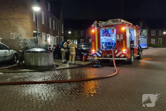 Brandstichting in papiercontainer