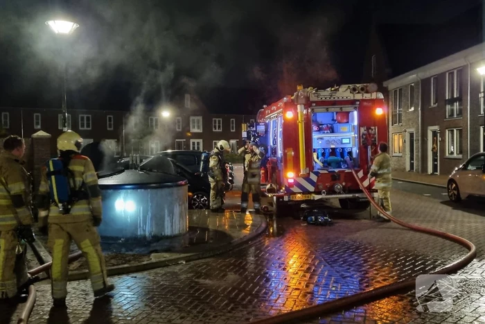 Brandstichting in papiercontainer
