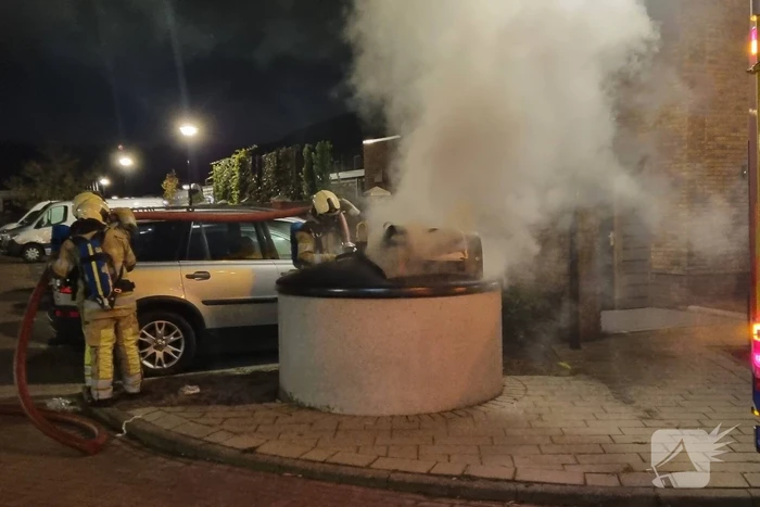Brandstichting in papiercontainer