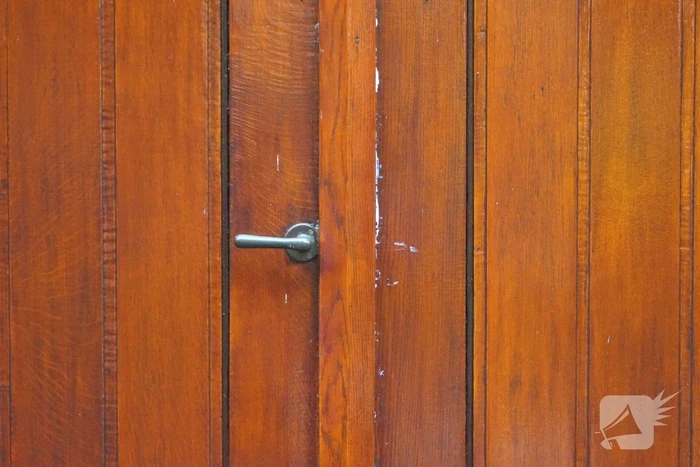 Deur gereformeerde kerk Noorderkerk dichtgekit