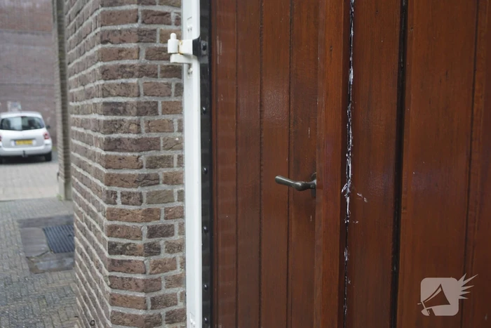 Deur gereformeerde kerk Noorderkerk dichtgekit