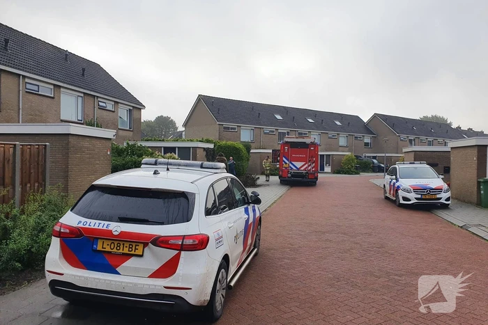 Voordeur woning geforceerd bij waterlekkage