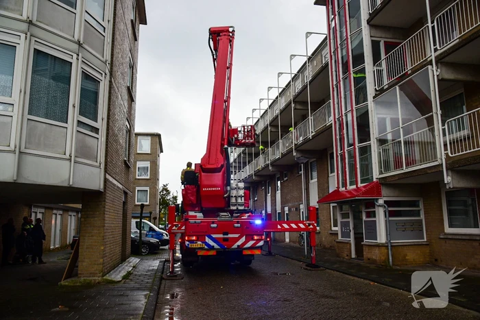 Brandweer blust brand in wasdroger