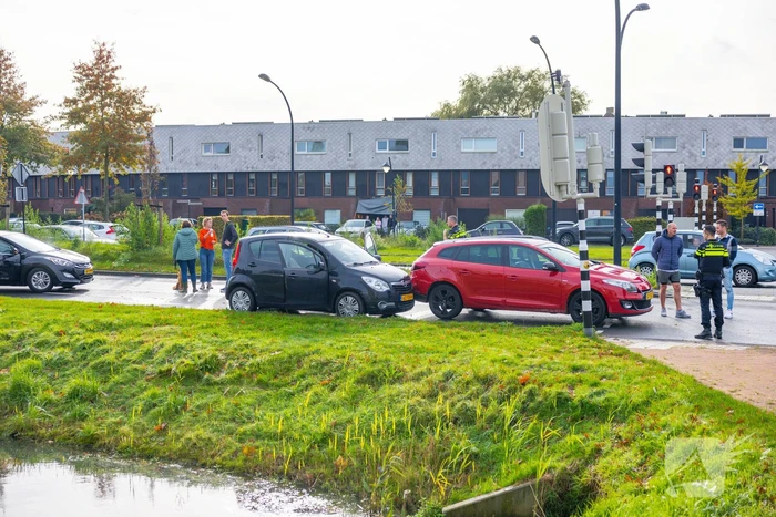 Kop-staart botsing voor stoplicht