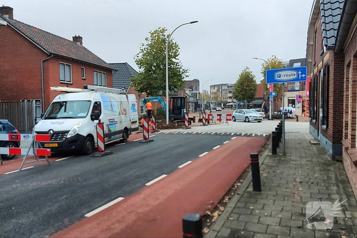 Straat afgezet door waterlekkage