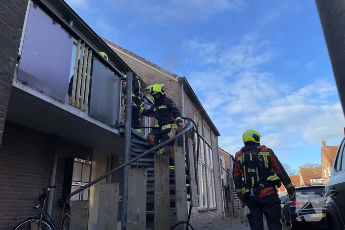 Deur open gezaagd bij brand