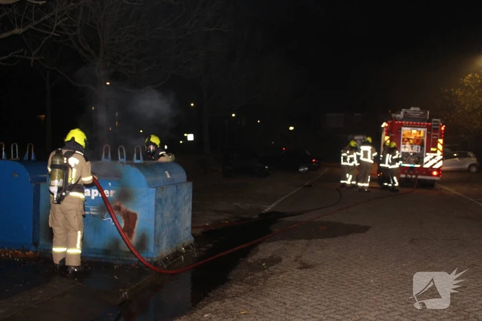 Brandstichting in container met papier