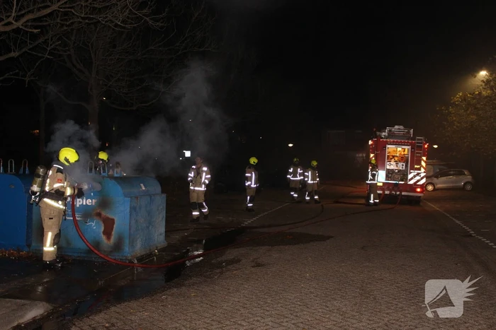 Brandstichting in container met papier