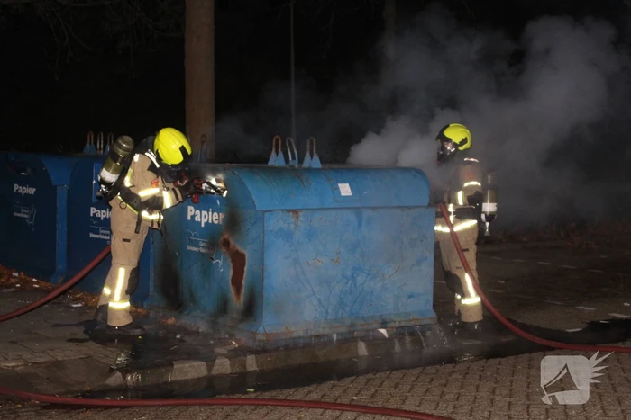 Brandstichting in container met papier