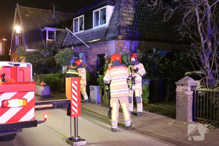 Brand in schoorsteen van woning