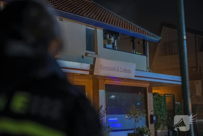 Uitslaande brand in winkelpand