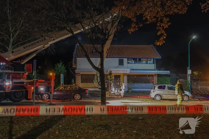 Uitslaande brand in winkelpand