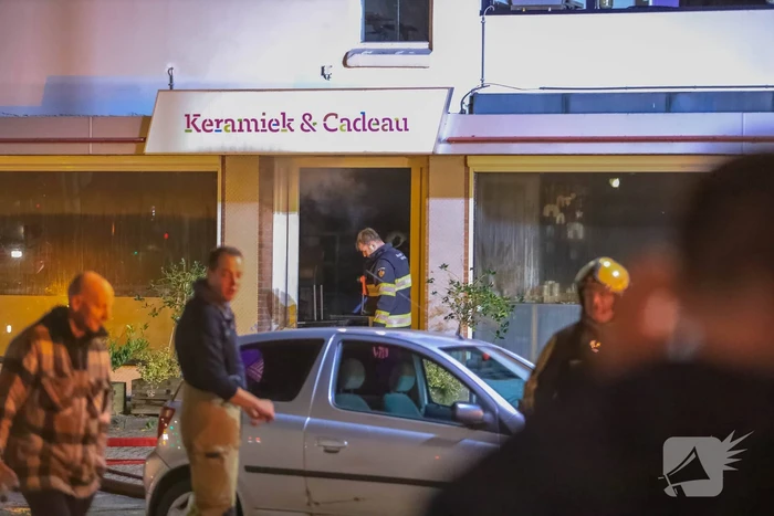 Uitslaande brand in winkelpand