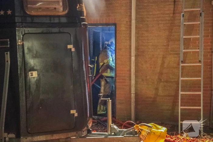 Uitslaande brand in winkelpand