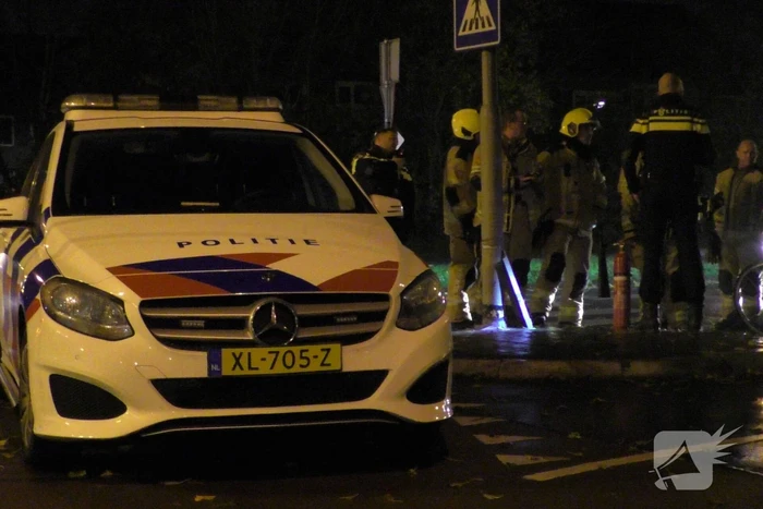 Lantaarnpaal in brand