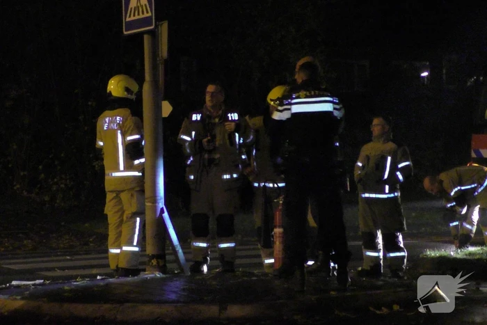 Lantaarnpaal in brand