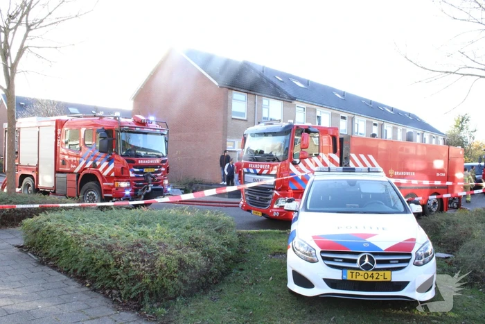 Uitslaande brand in dak van woning