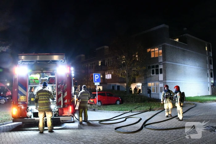 Brand in portiekwoning snel geblust