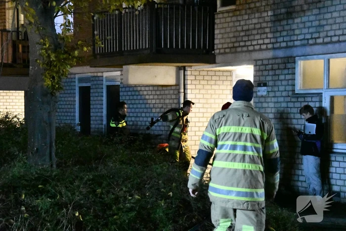 Brand in portiekwoning snel geblust