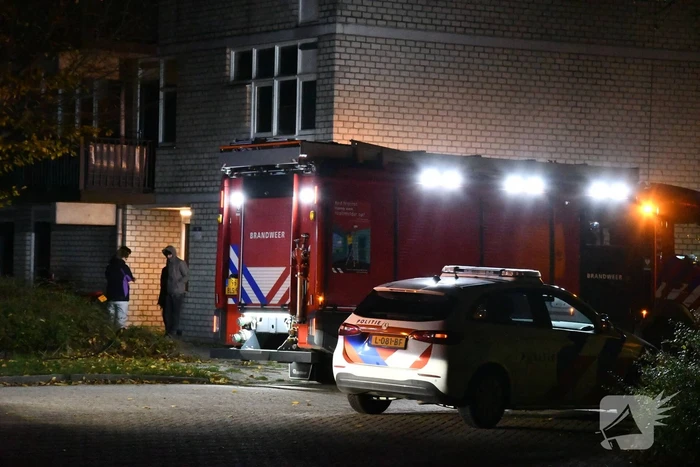 Brand in portiekwoning snel geblust