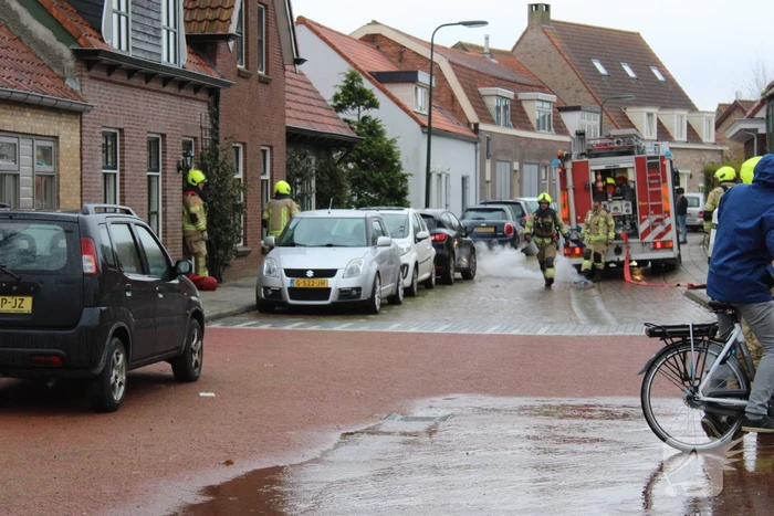 Brandweer blust schoorsteenbrand