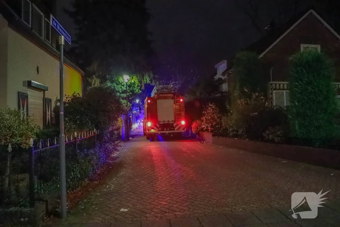 Brandweer blust schoorsteenbrand