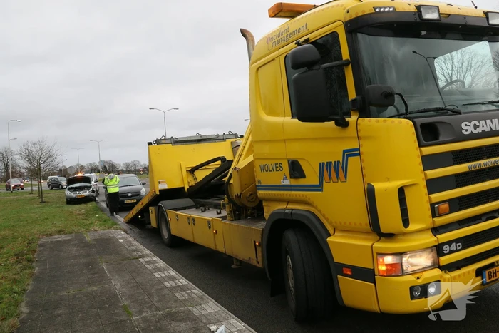 Schade bij botsing op rotonde