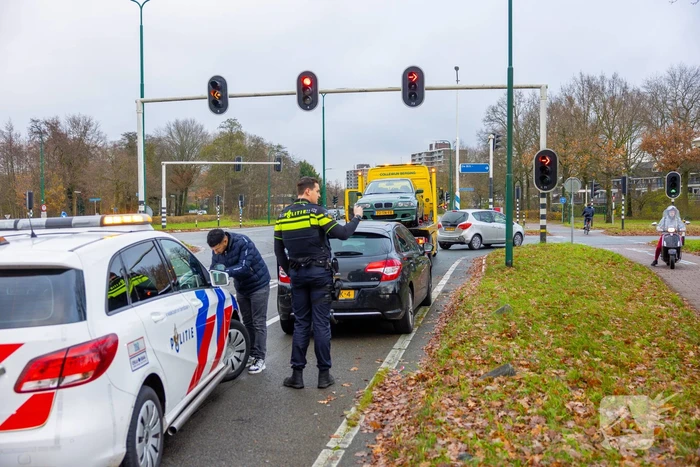 Schade na botsing tussen twee auto's