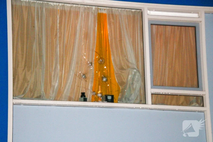 Politie doet onderzoek naar kogelgaten in woning