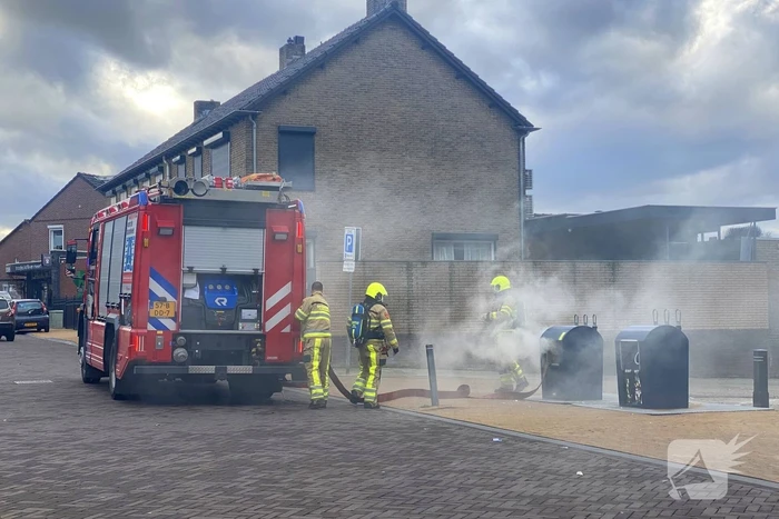 Ondergrondse container in brand