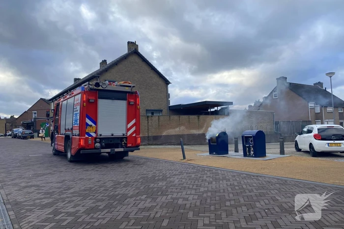 Ondergrondse container in brand
