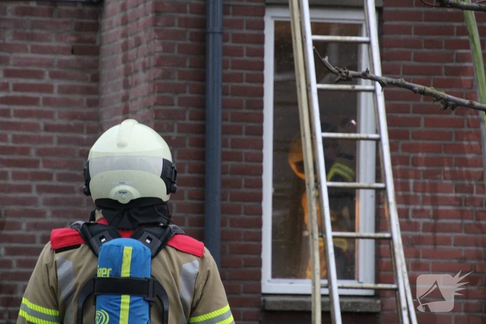 Brand in afzuigkap van woning