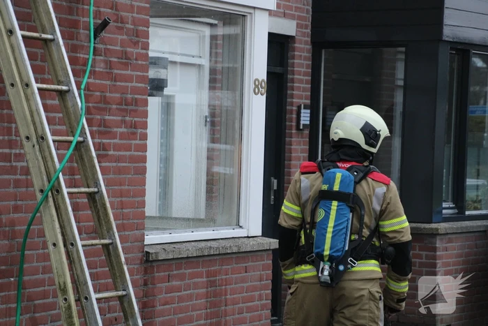 Brand in afzuigkap van woning