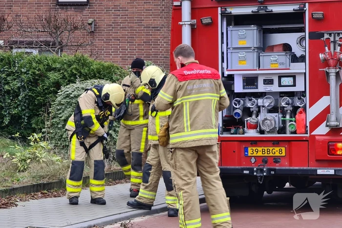 Brandweer blust schoorsteenbrand