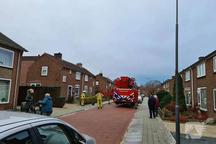Brandweer blust schoorsteenbrand