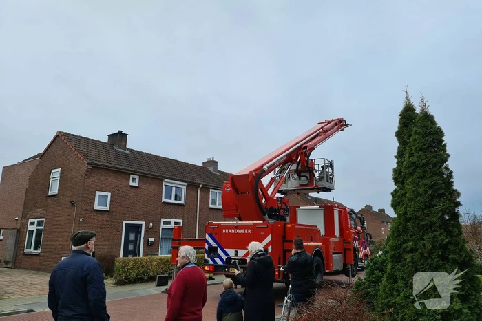 Brandweer blust schoorsteenbrand