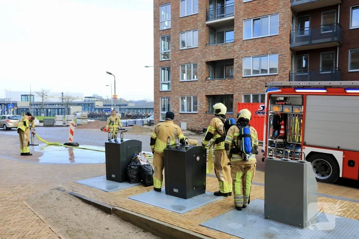 Brand in ondergrondse PMD-container