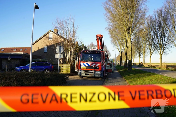 Brand in schoorsteen van woning