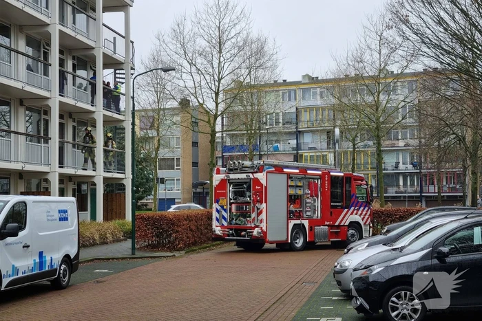 Brand in keuken van flatwoning
