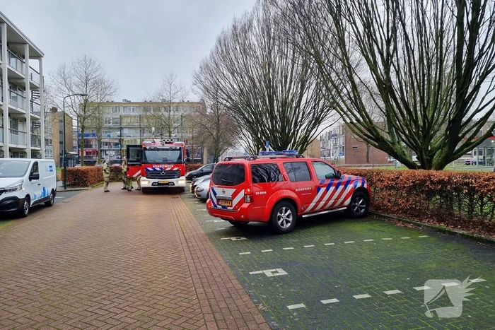 Brand in keuken van flatwoning