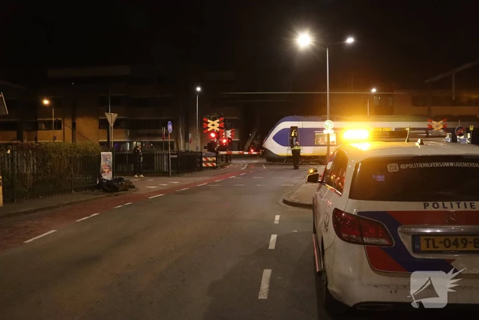 Scooter aangereden door trein