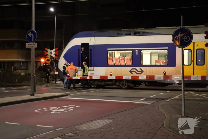 Scooter aangereden door trein
