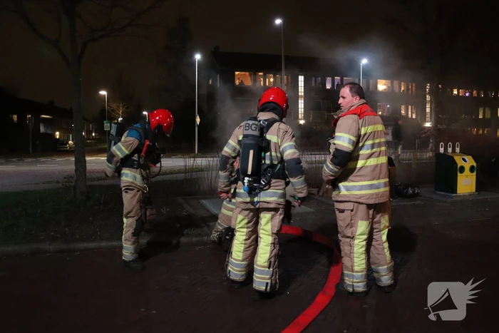 Rookontwikkeling bij brand in papiercontainer