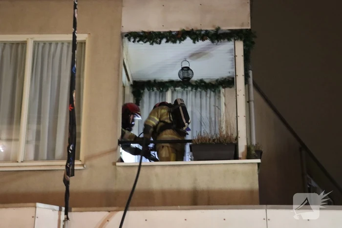 Korte felle wasmachinebrand in bovenwoning
