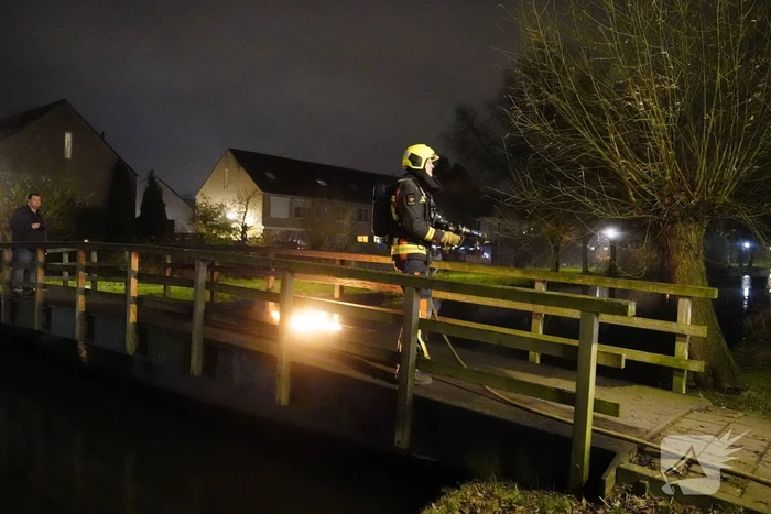 Brandstichting op houten brug