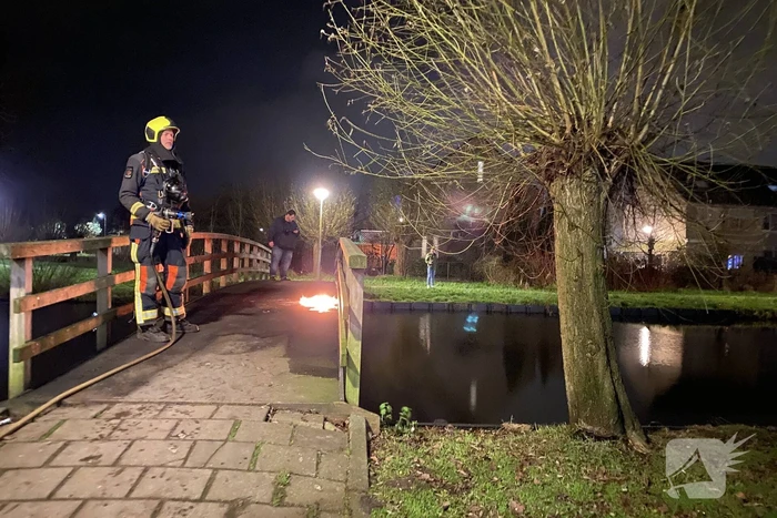 Brandstichting op houten brug