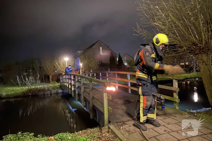 Brandstichting op houten brug