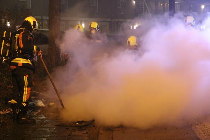 Stapel hout in brand gestoken