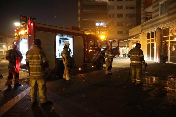 Brand in stapel karton