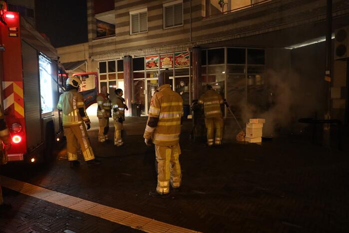 Brand in stapel karton